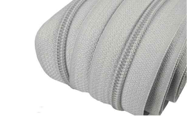 Metrážový zip spirálový 5mm šedý 329