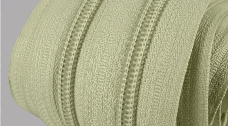 Metrážový zip spirálový 3mm světle zelený 244